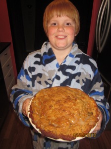Henry is proud of his cinnamon apple pie!